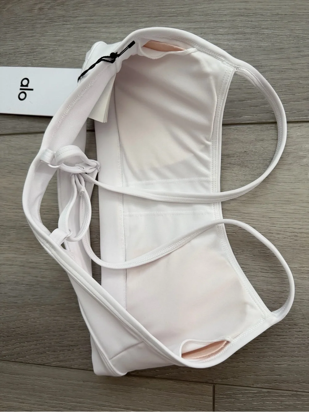 ALO Yoga Airlift Intrigue Bra in White  — Size XS
